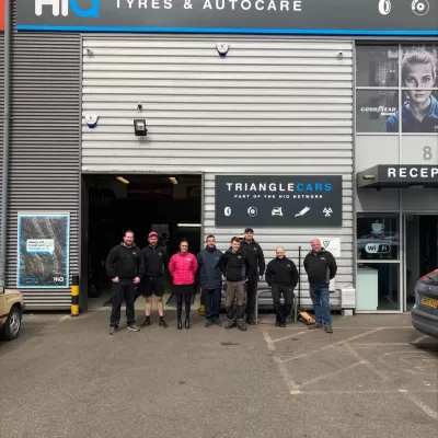 Hi Q Tyres Autocare Bodmin team picture with mugs
