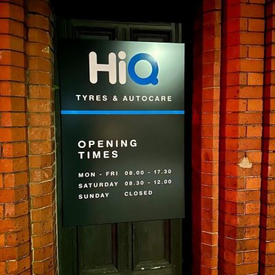 HiQ Tyres & Autocare Chester opening times sign