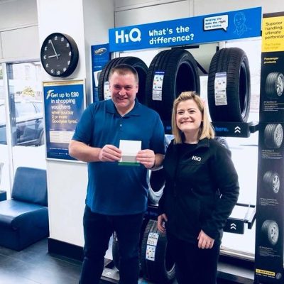 Hi Q Lanark Claire with JL voucher winner colin marshall