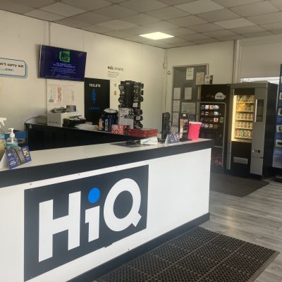 Hi Q Lanark Reception desk and signage