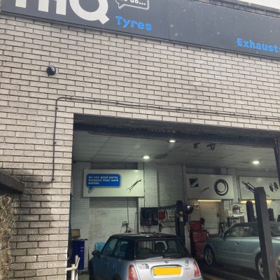 Hi Q Tyres Autocare Truro Marketing Team Visit May 22 Exterior Signage and Cars