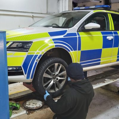 HiQ Burton Servicing Police Car