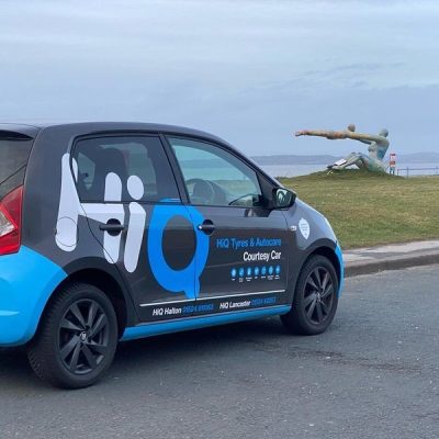 Hi Q Tyres Autocare Lancaster and Holton Courtesy Car near statue