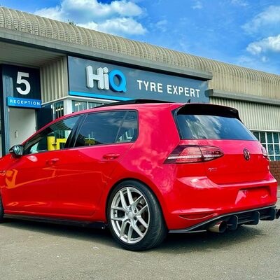 Hi Q Tyre Expert Newcastle with Red Volkswagen in front