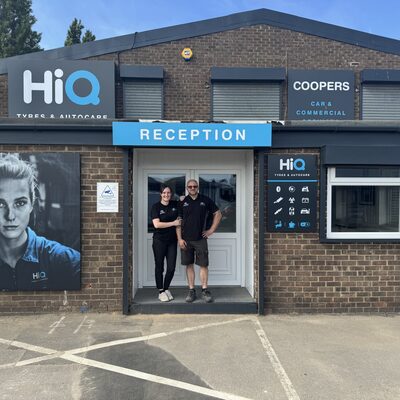 Hi Q Stockton Donna and Mike in Front of the Store