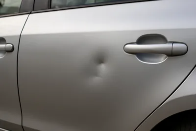 Car with a dent