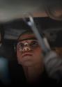 Technicians under vehicle