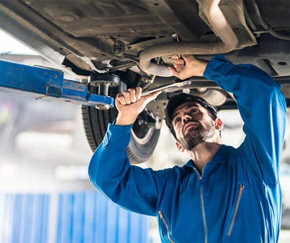 Mechanic working under carriage