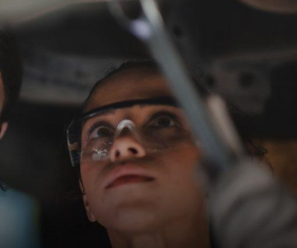 Technicians under vehicle