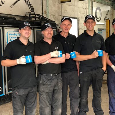 Hi Q Tyres Autocare Bodmin team picture with mugs